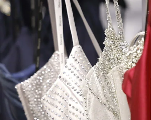 Wedding outfits on hangers; BBFW archive.