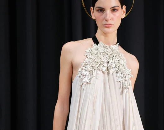 A model in a white wedding dress; BBFW archive.